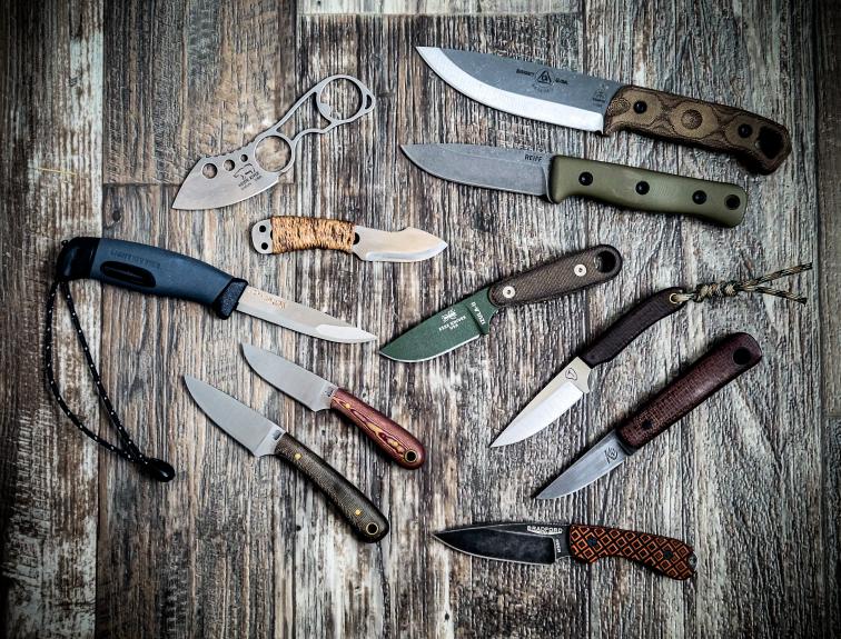 An assortment of fixed blade knives mentioned in the article